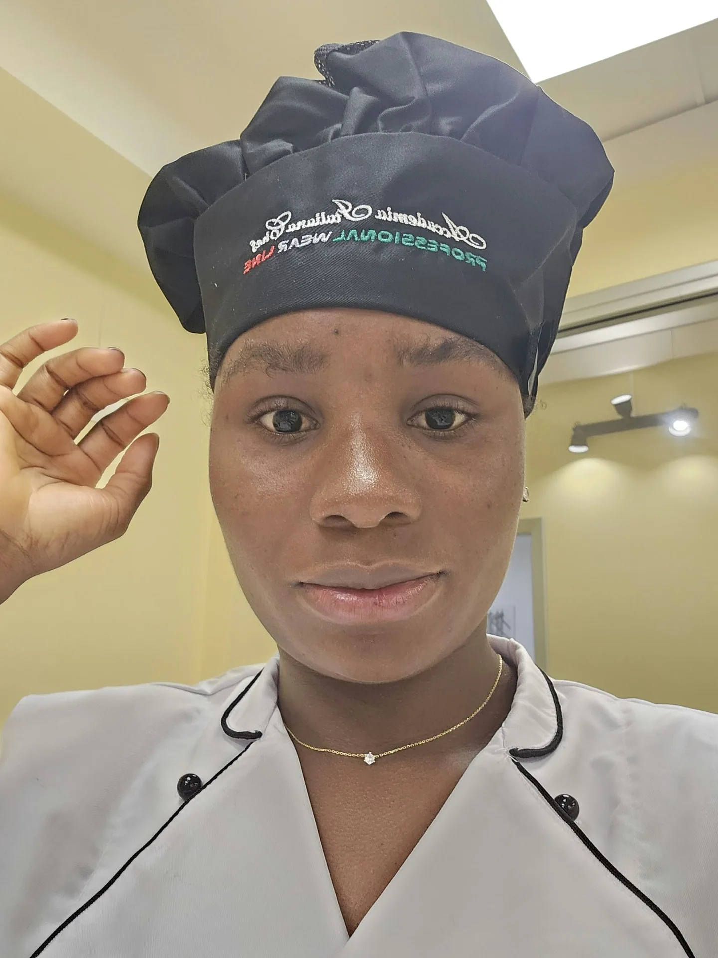 Ritratto di Blessing con cappello da chef